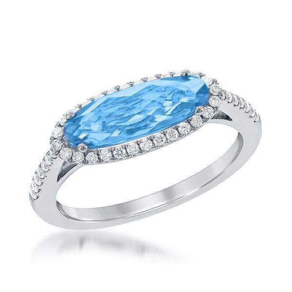 View 14Kw or y/14kr Gold Blue Topaz Ring